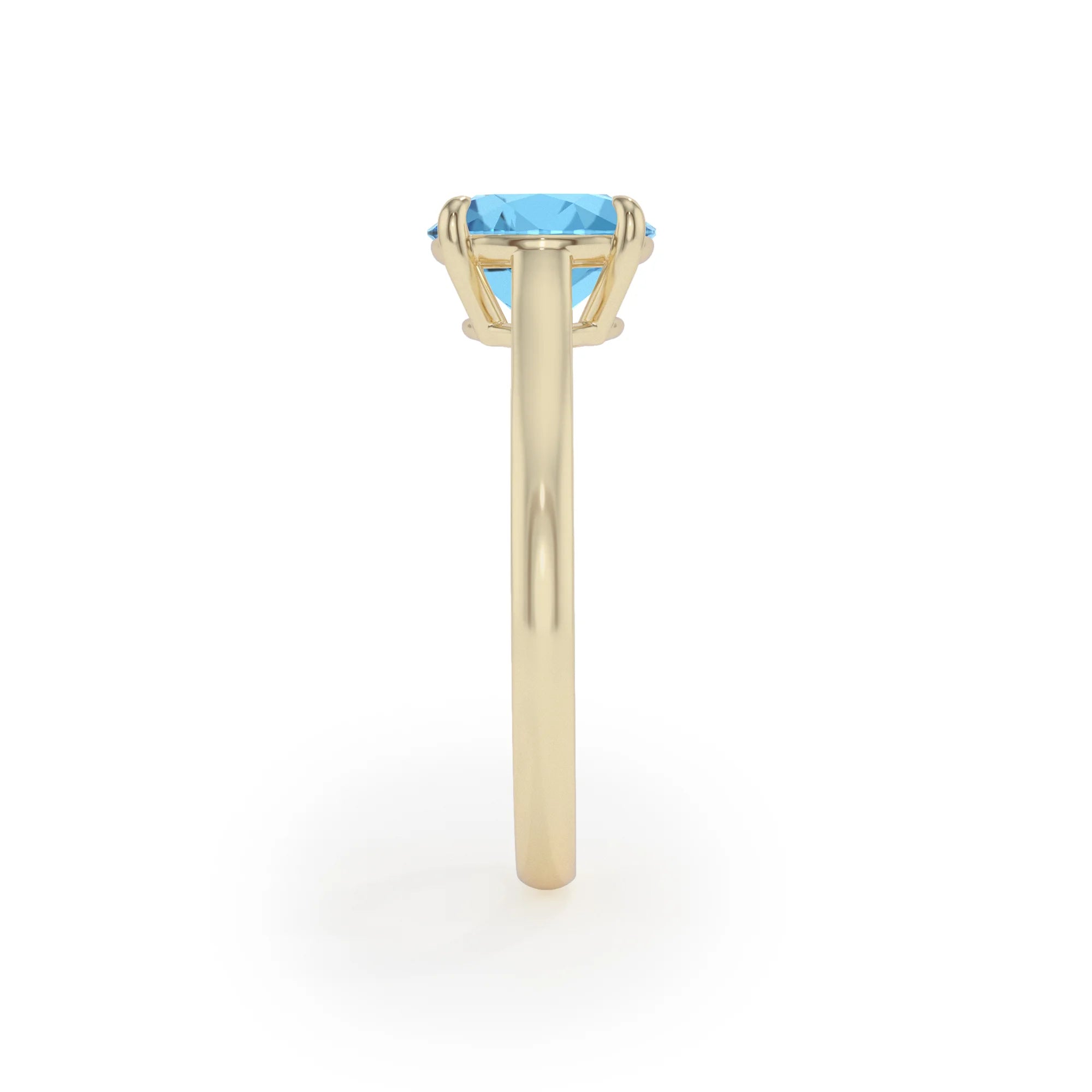 natural swiss-blue-topaz round solitaire rings in yellow gold