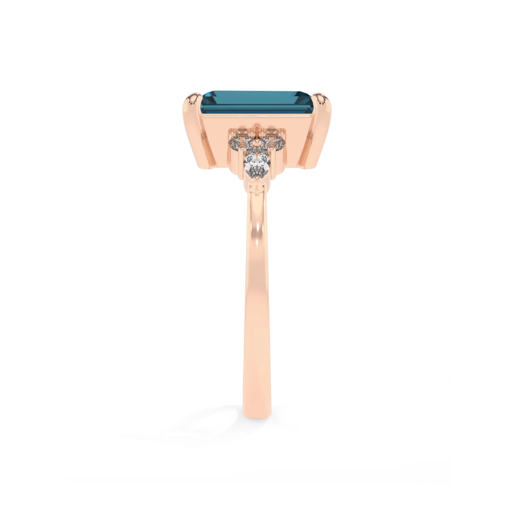 natural london-blue-topaz emerald cut solitaire rings in rose gold