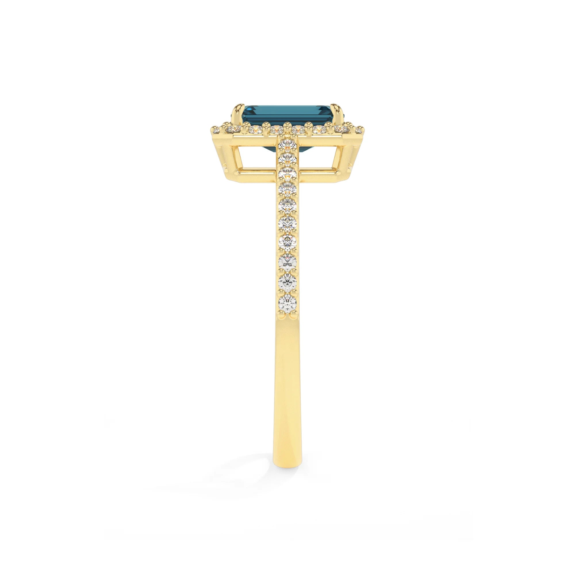 natural london-blue-topaz emerald cut solitaire rings in yellow gold