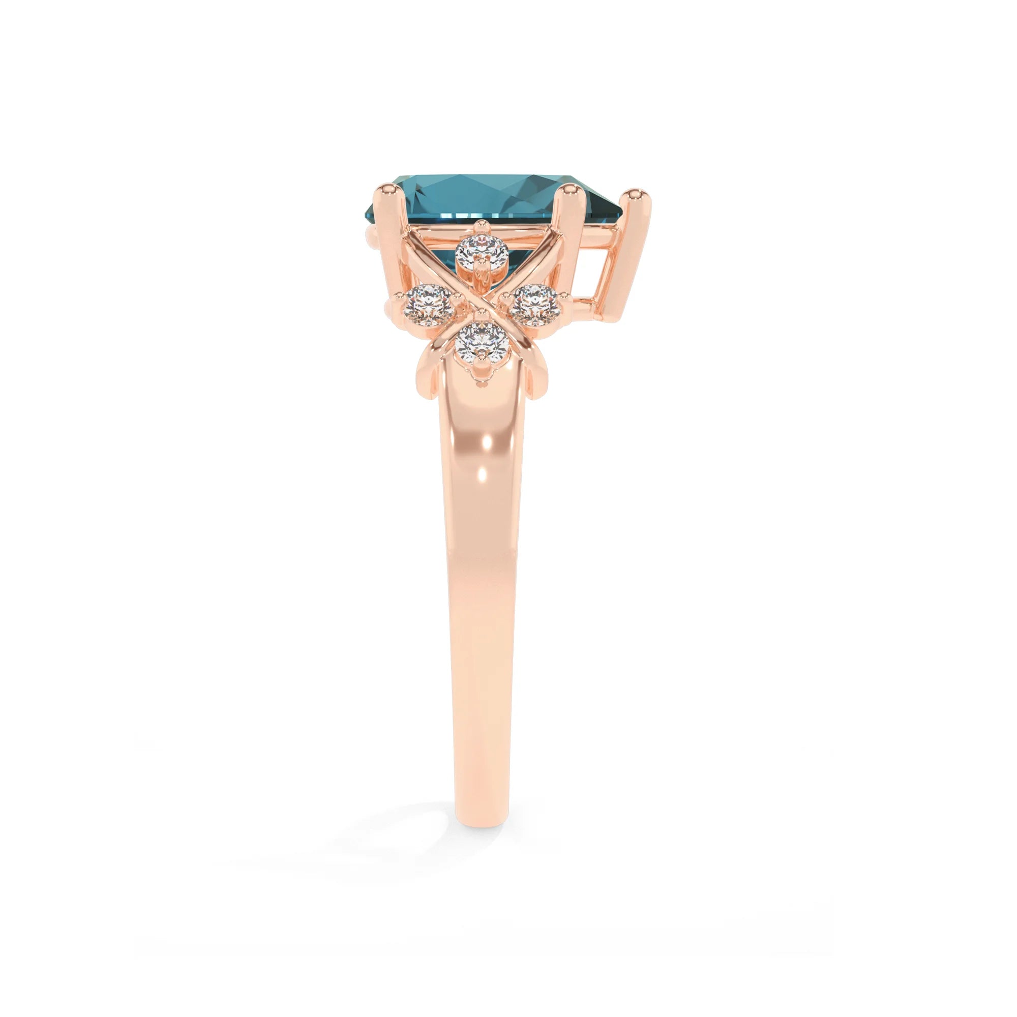 natural london-blue-topaz pear solitaire rings in rose gold