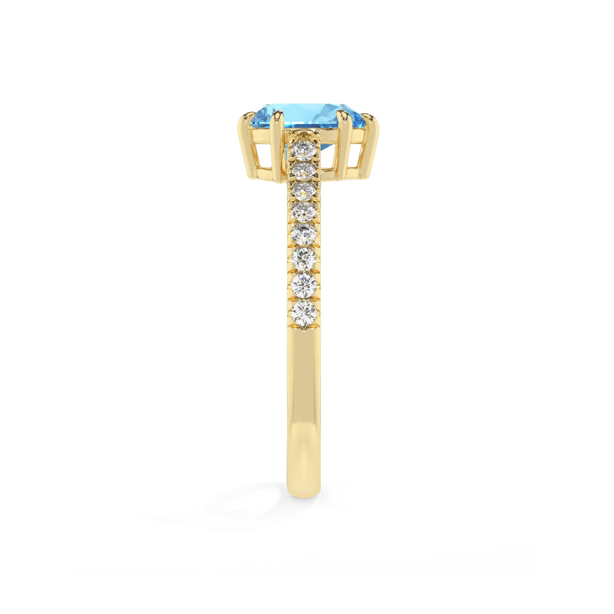 natural swiss-blue-topaz pear half eternity solitaire engagement rings in yellow gold