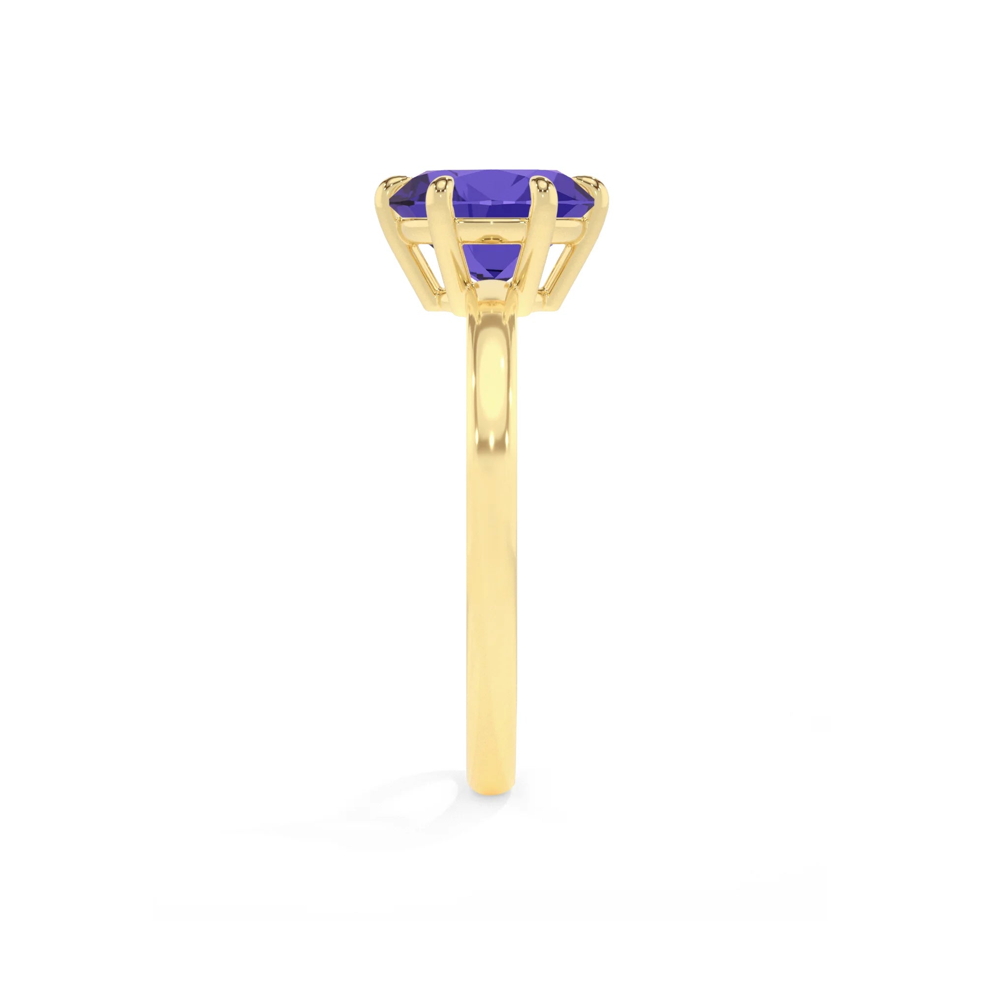 lab grown tanzanite round solitaire rings in yellow gold