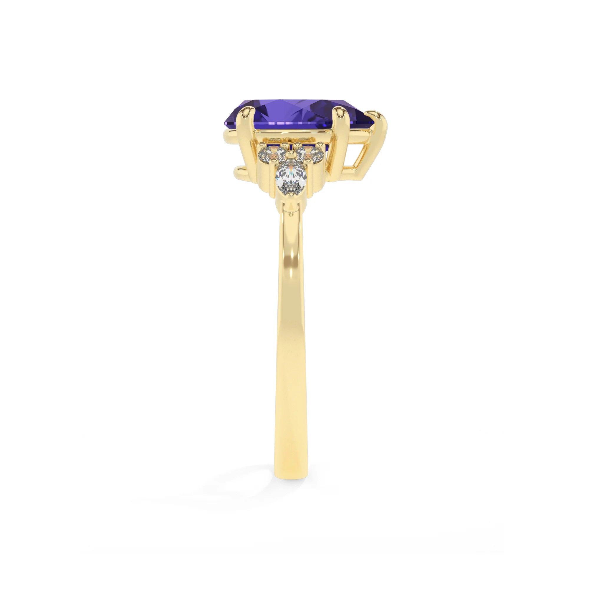 lab grown tanzanite pear solitaire rings in yellow gold