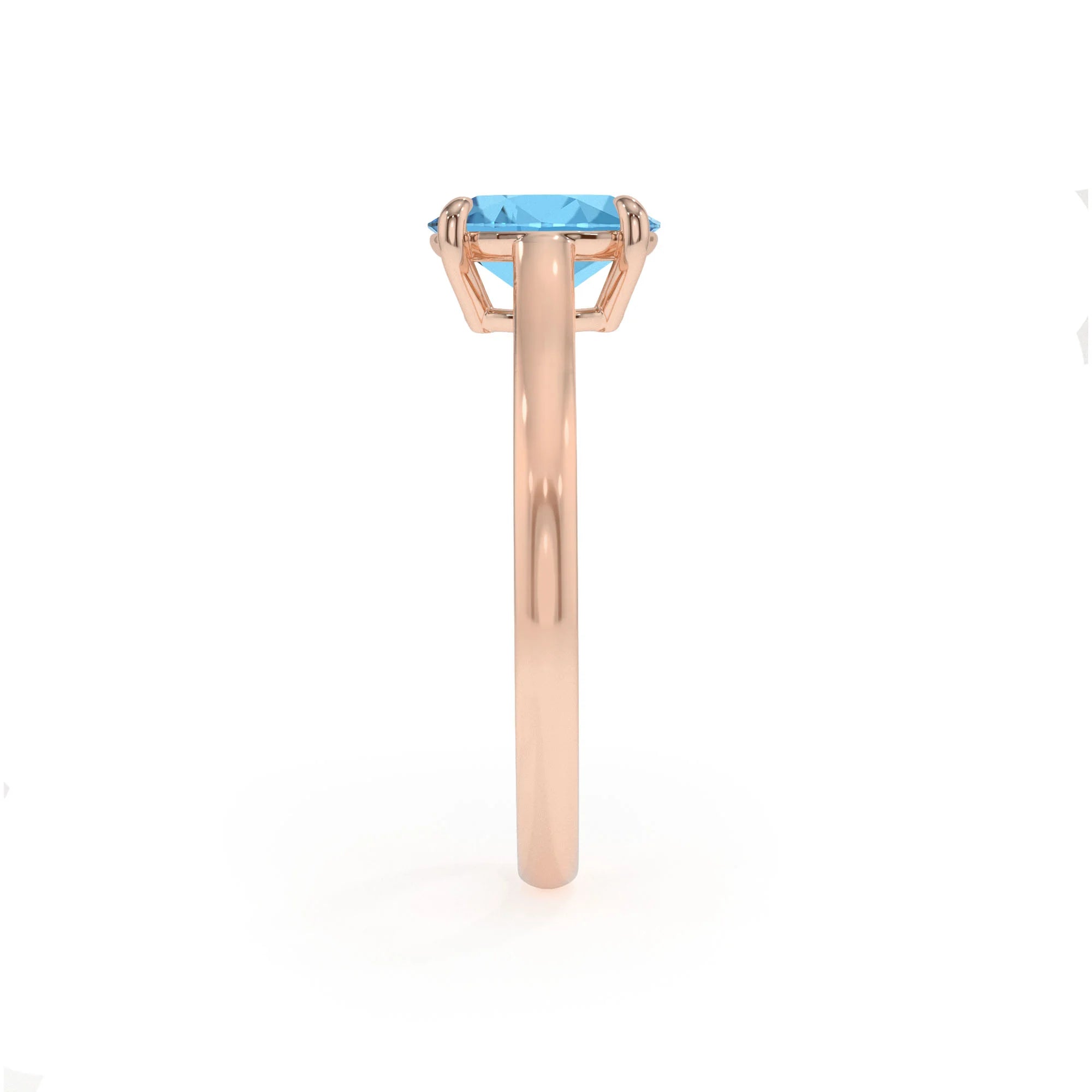 natural swiss-blue-topaz oval solitaire rings in rose gold