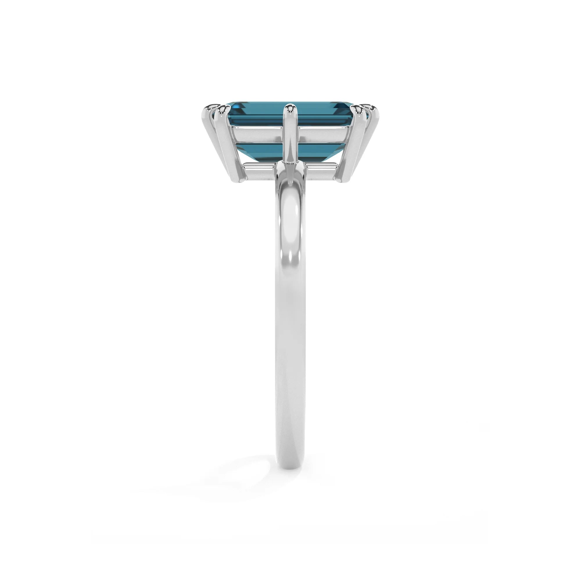 natural london-blue-topaz emerald cut solitaire rings in white gold