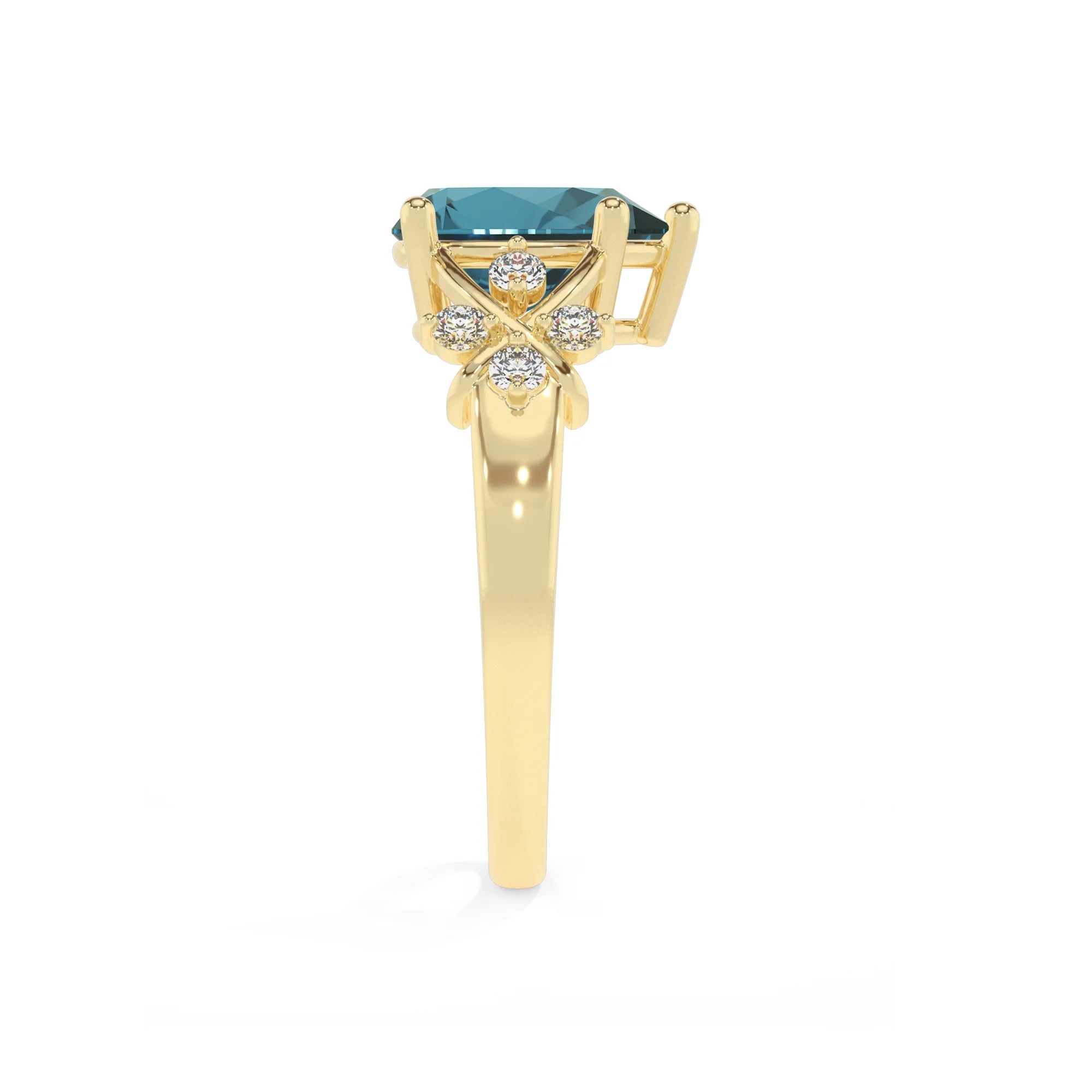 natural london-blue-topaz pear solitaire rings in yellow gold