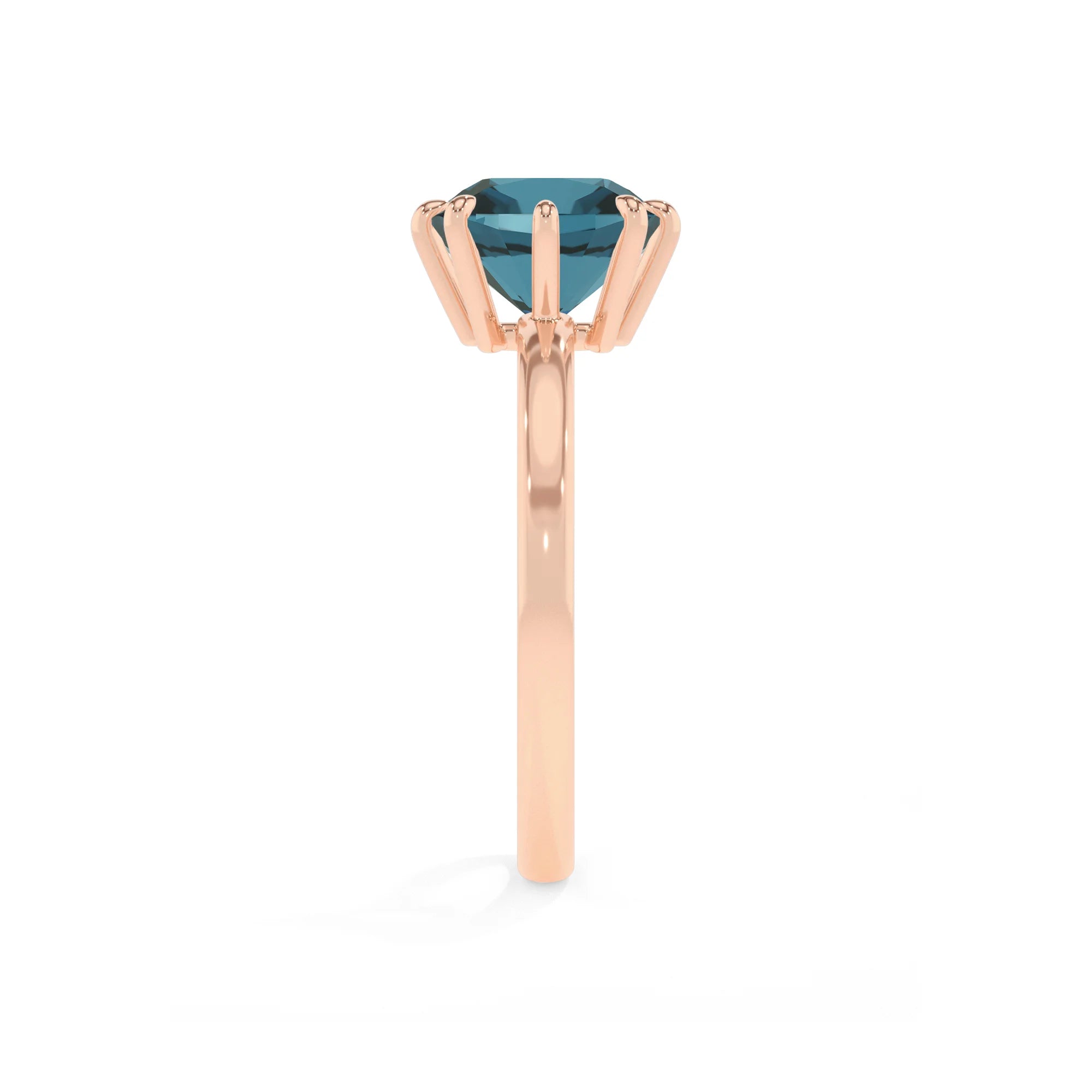 natural london-blue-topaz cushion solitaire rings in rose gold