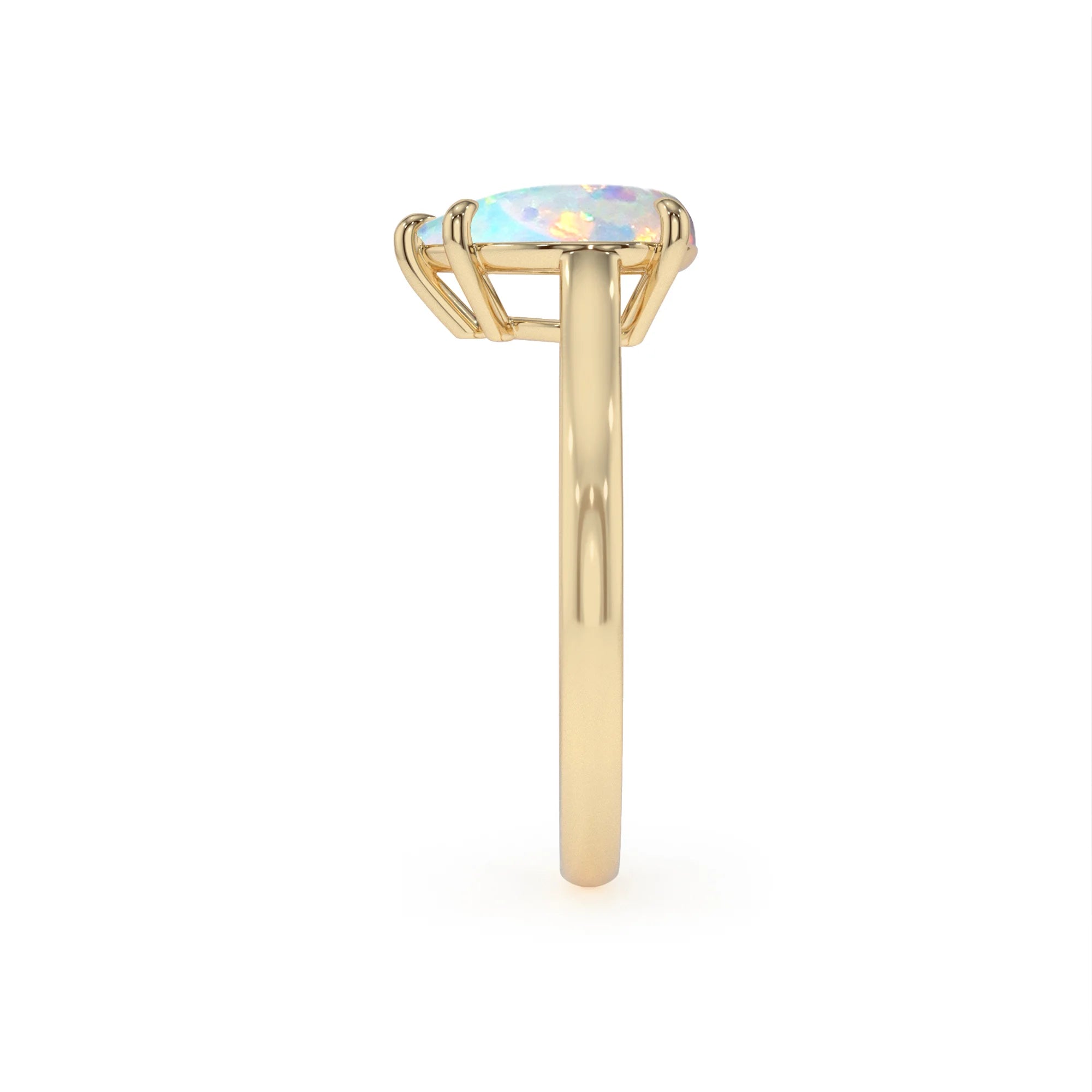 lab grown opal pear solitaire rings in yellow gold