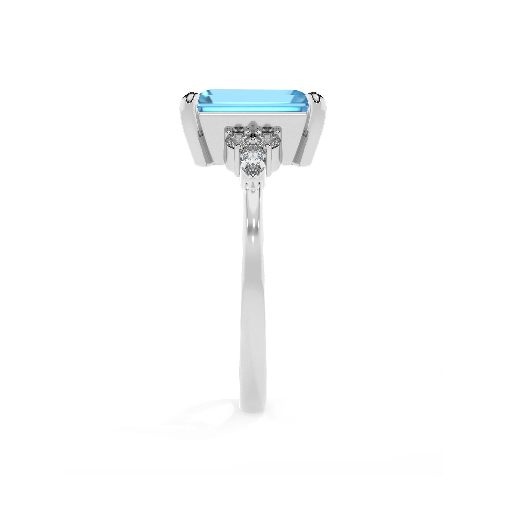 natural swiss-blue-topaz emerald cut solitaire rings in white gold