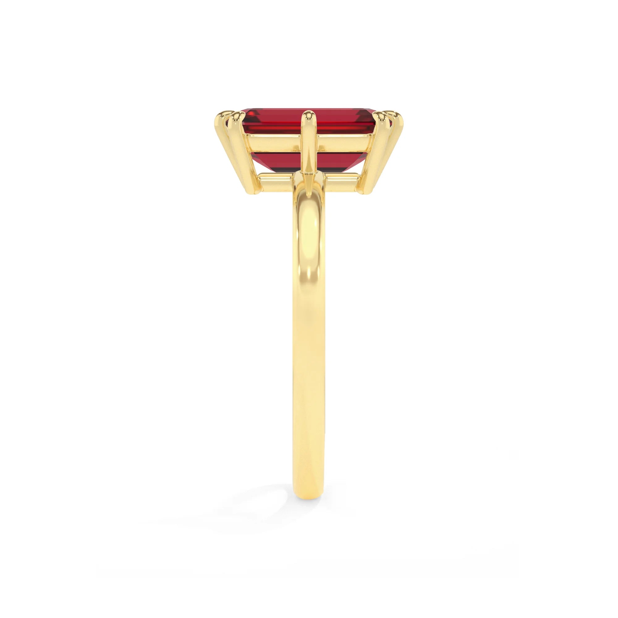 lab grown ruby emerald cut solitaire rings in yellow gold