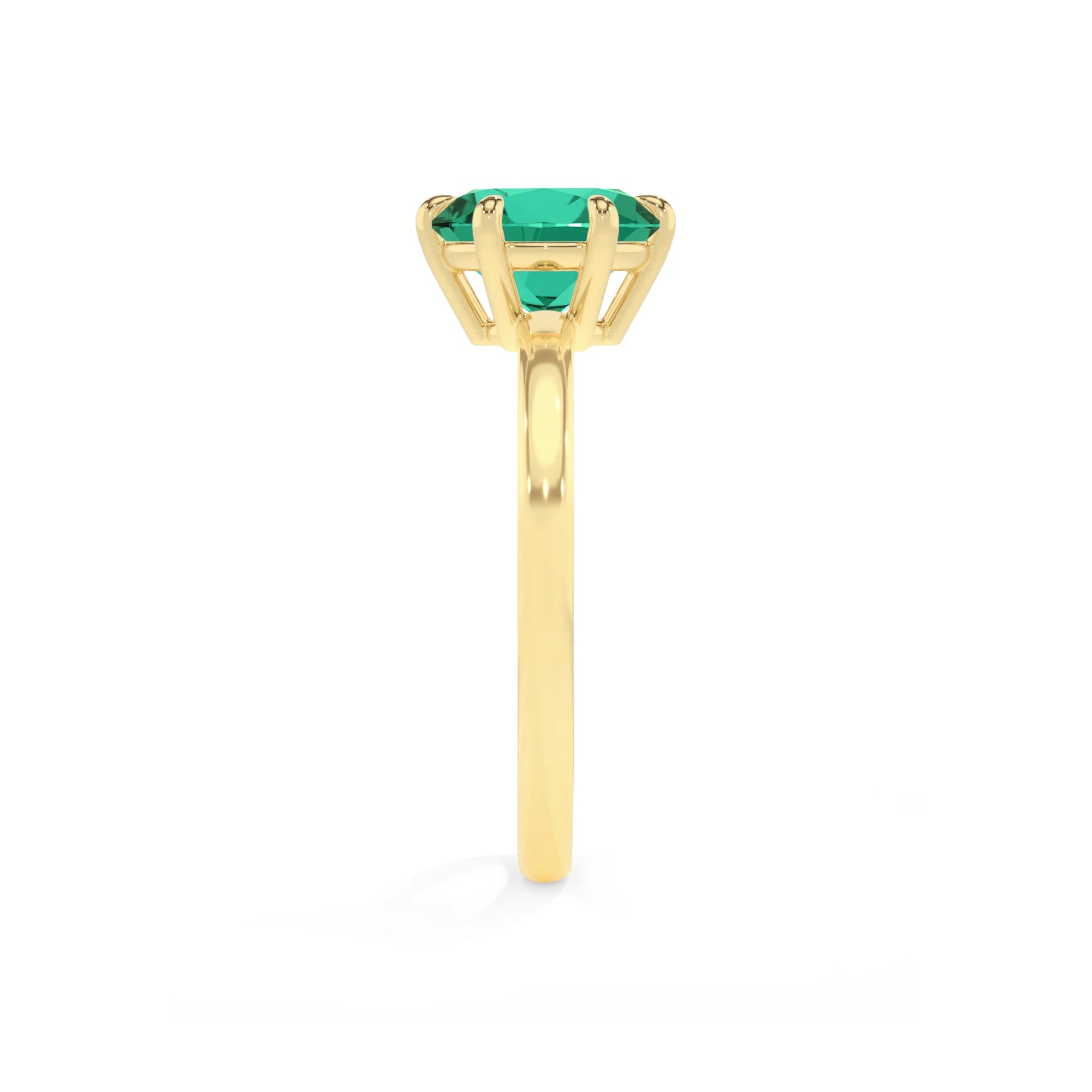lab grown emerald round solitaire rings in yellow gold
