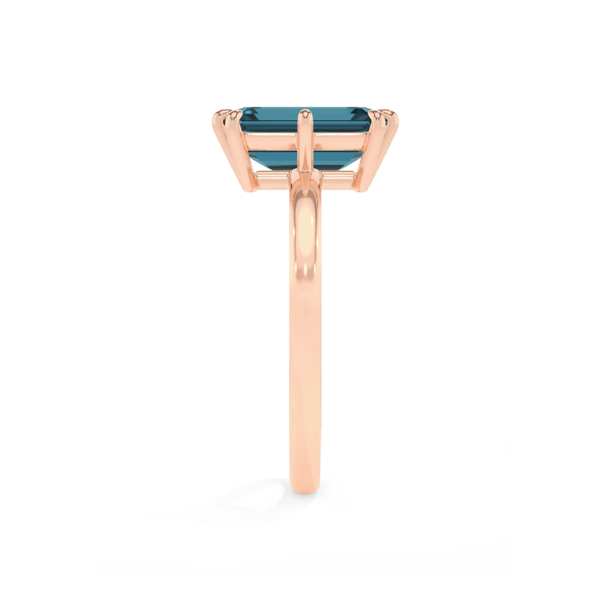 natural london-blue-topaz emerald cut solitaire rings in rose gold