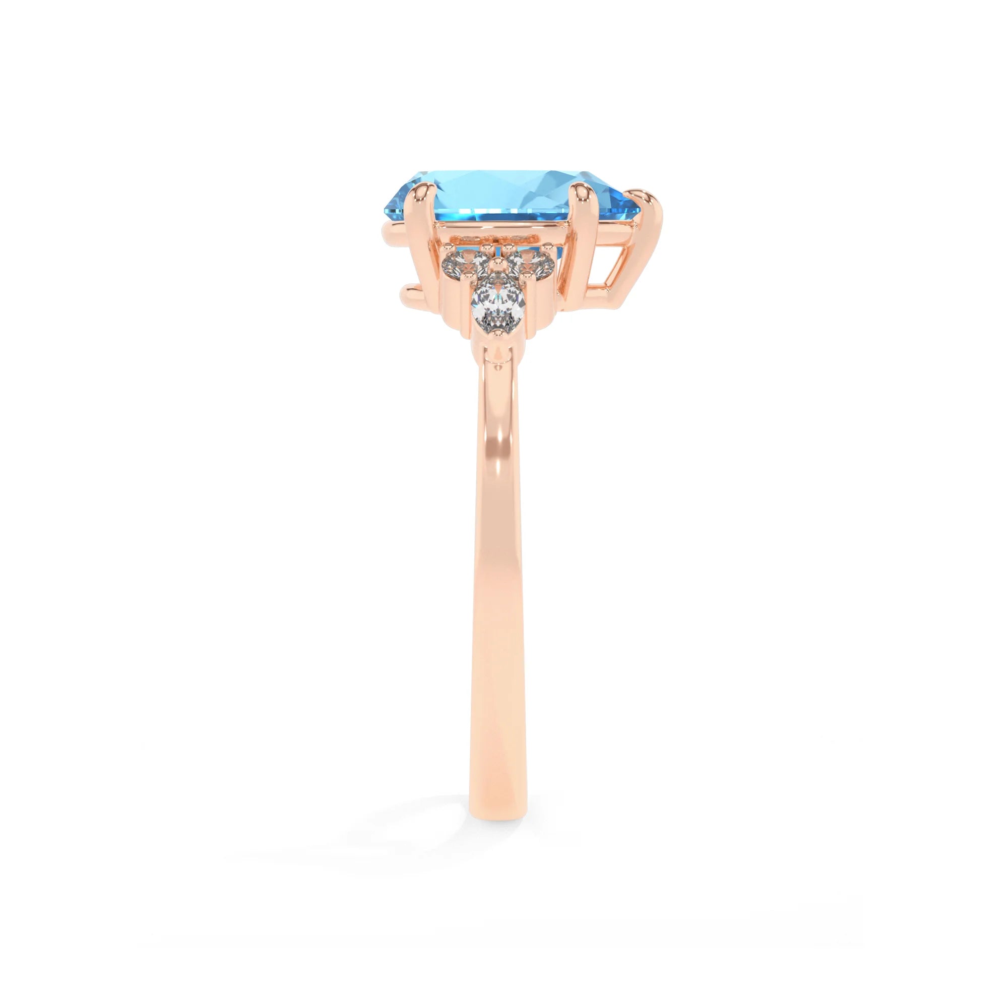 natural swiss-blue-topaz pear solitaire rings in rose gold