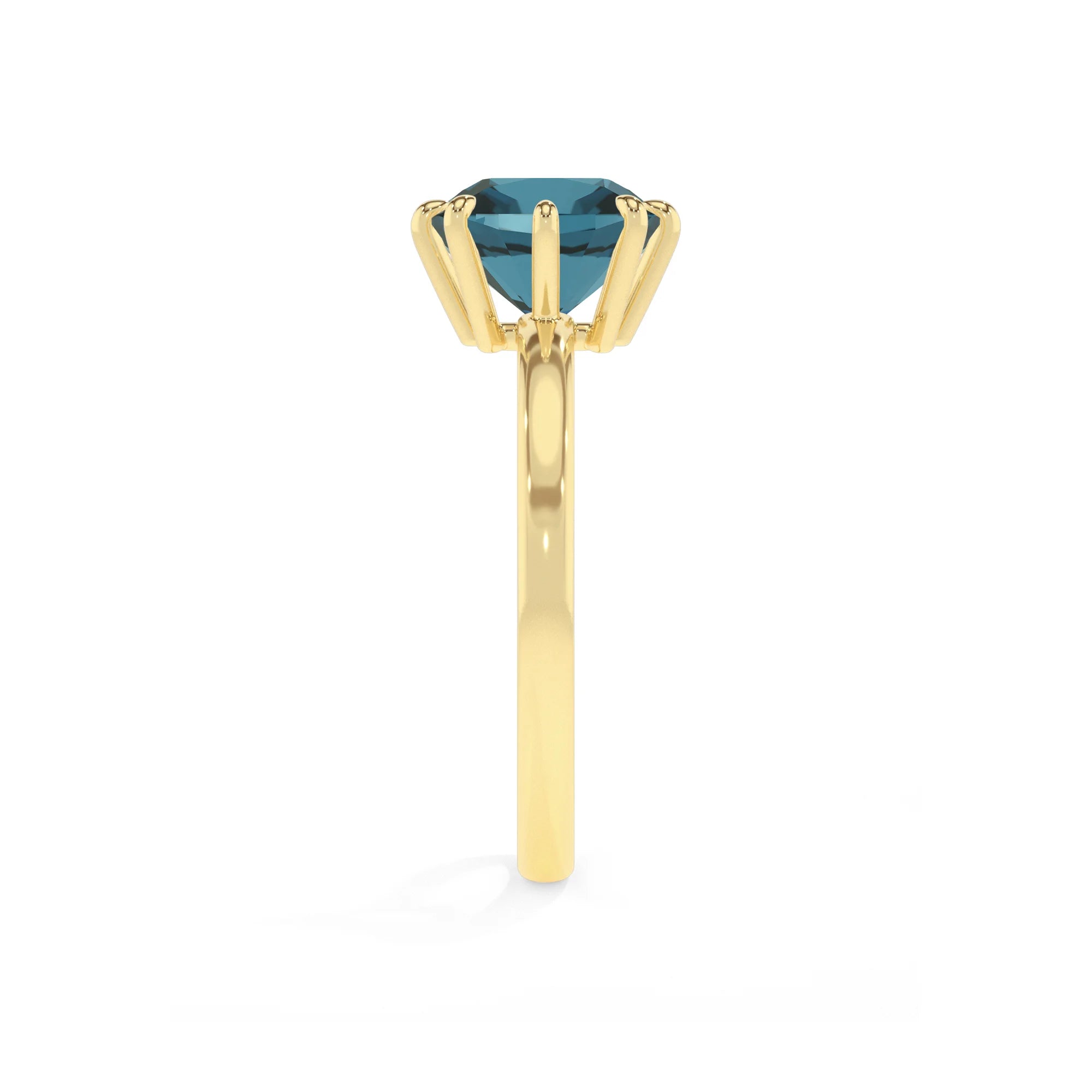natural london-blue-topaz cushion solitaire rings in yellow gold