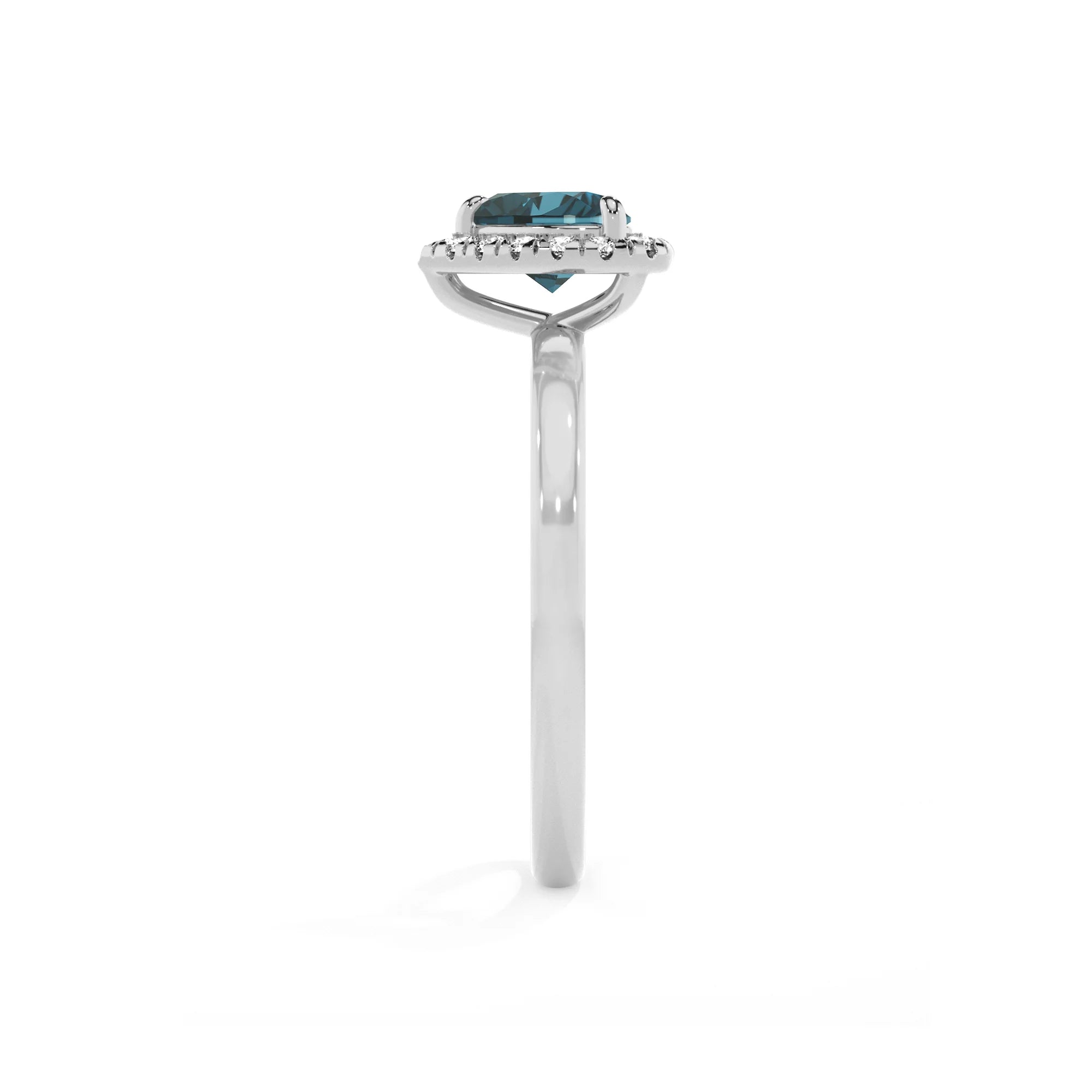 natural london-blue-topaz heart solitaire rings in platinum