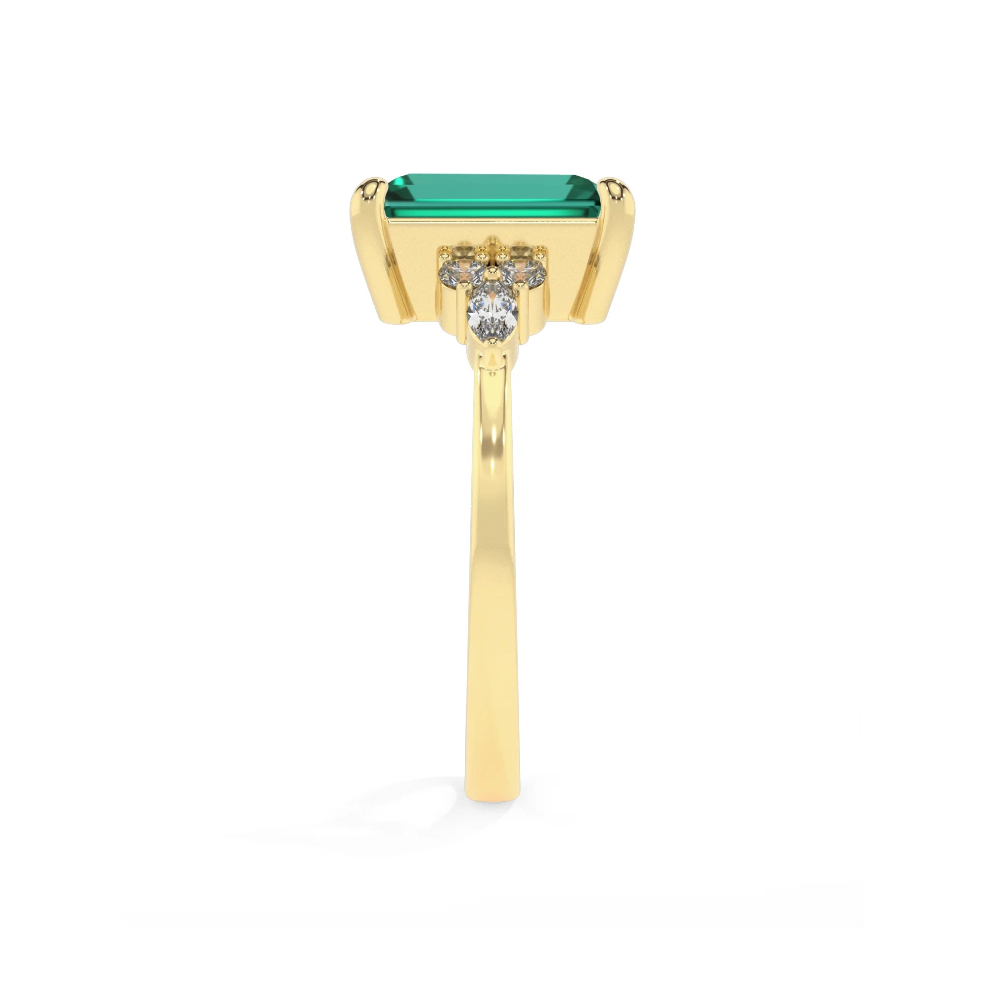 lab grown emerald octogon cut solitaire rings in yellow gold