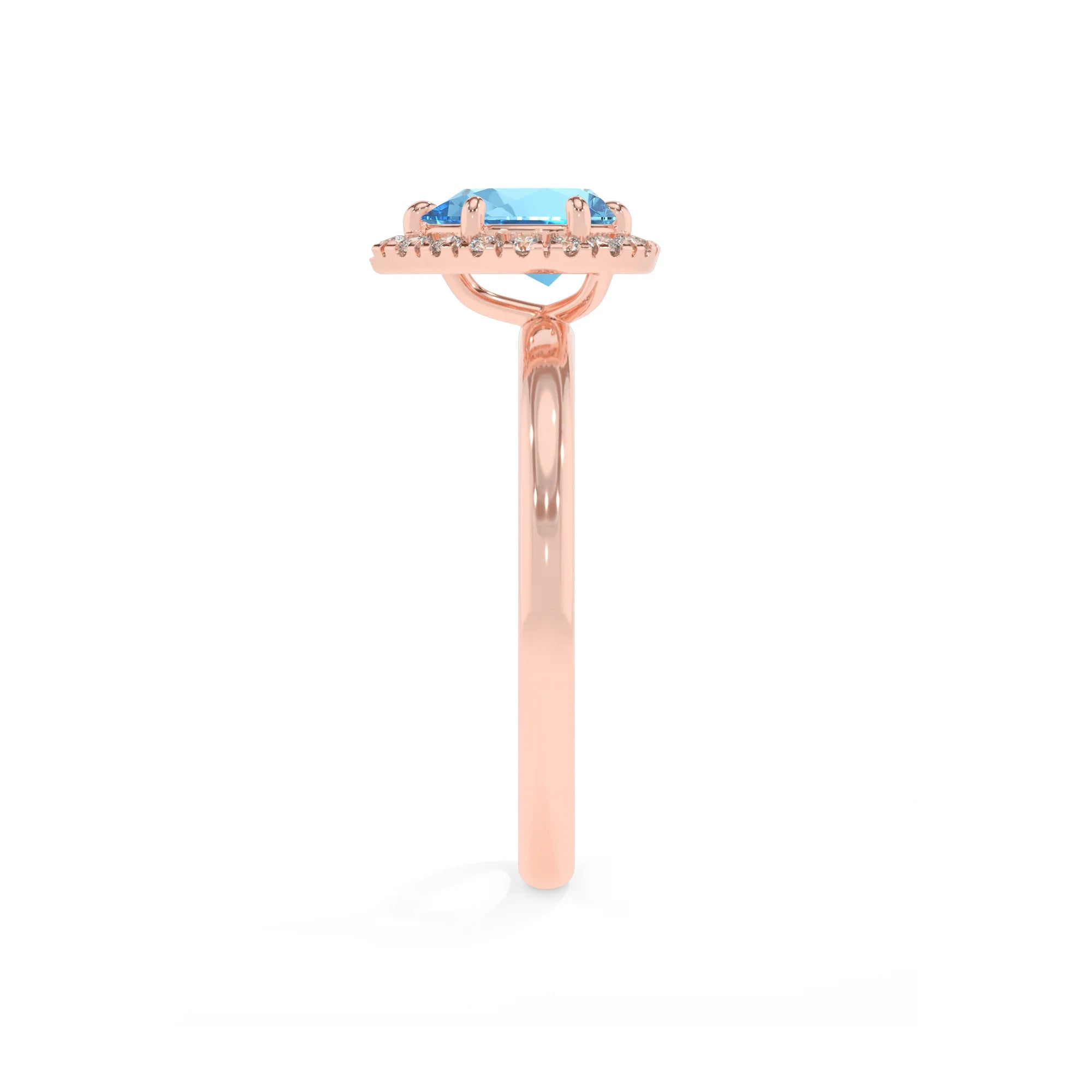 natural swiss-blue-topaz pear solitaire rings in rose gold