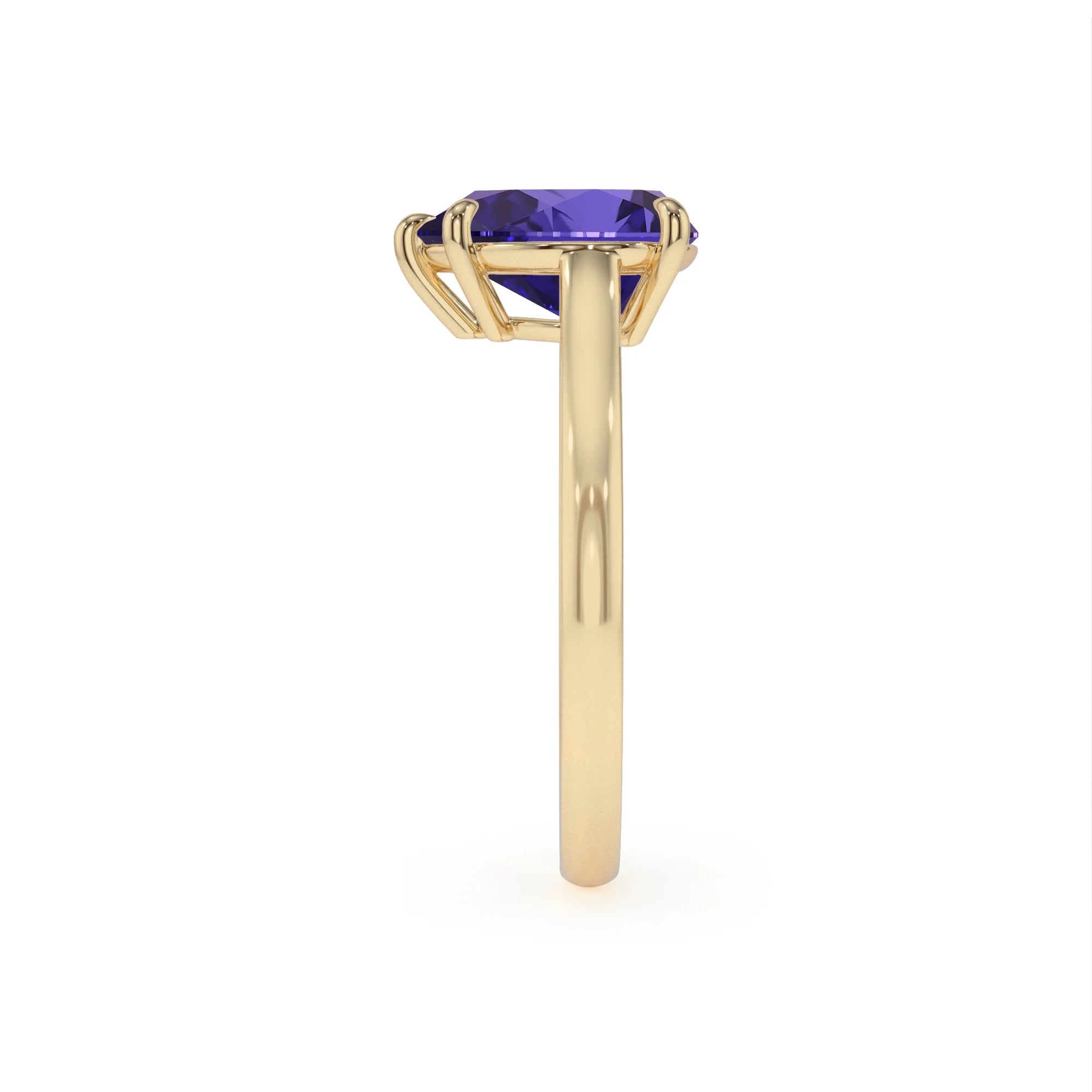 lab grown tanzanite pear solitaire rings in yellow gold