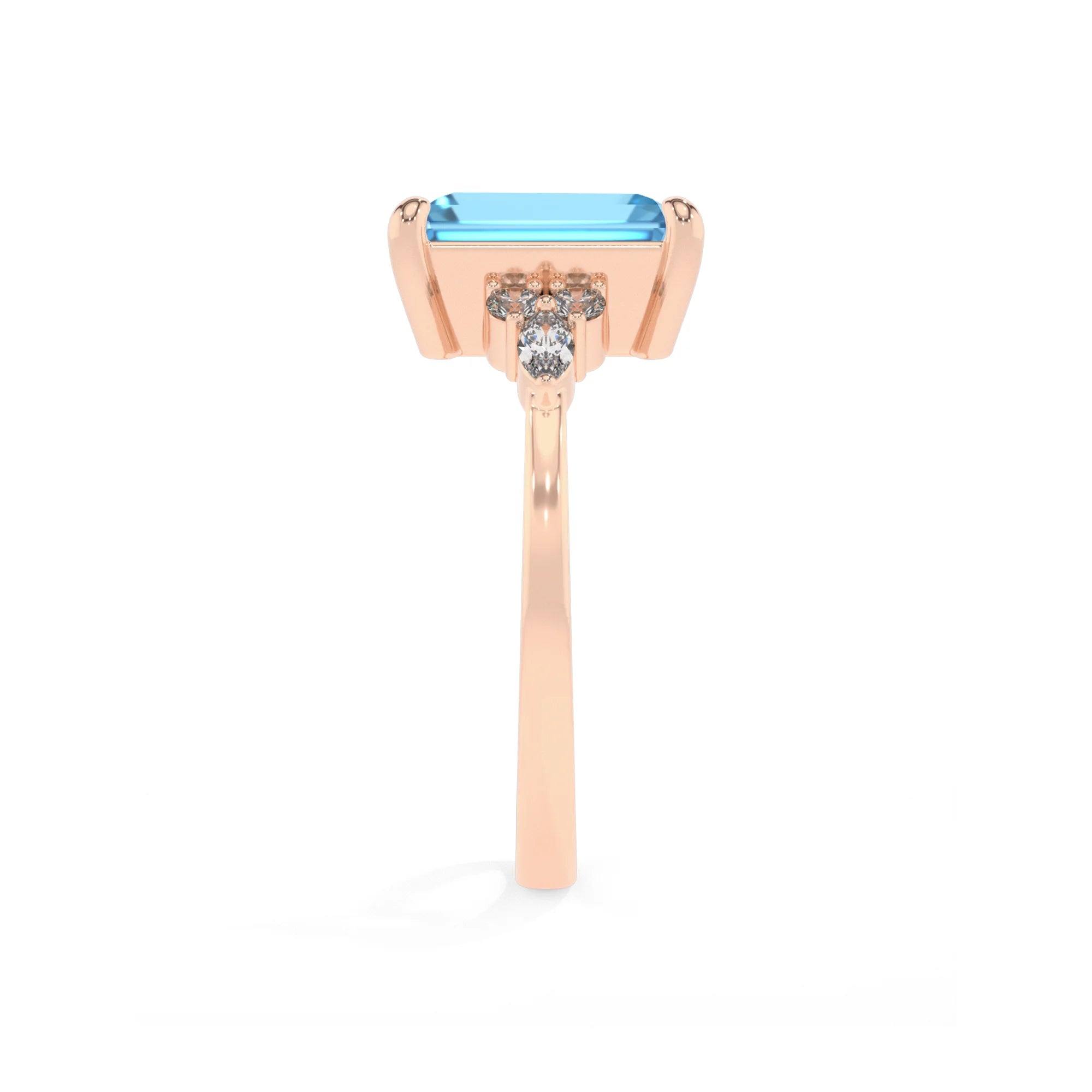 natural swiss-blue-topaz emerald cut solitaire rings in rose gold