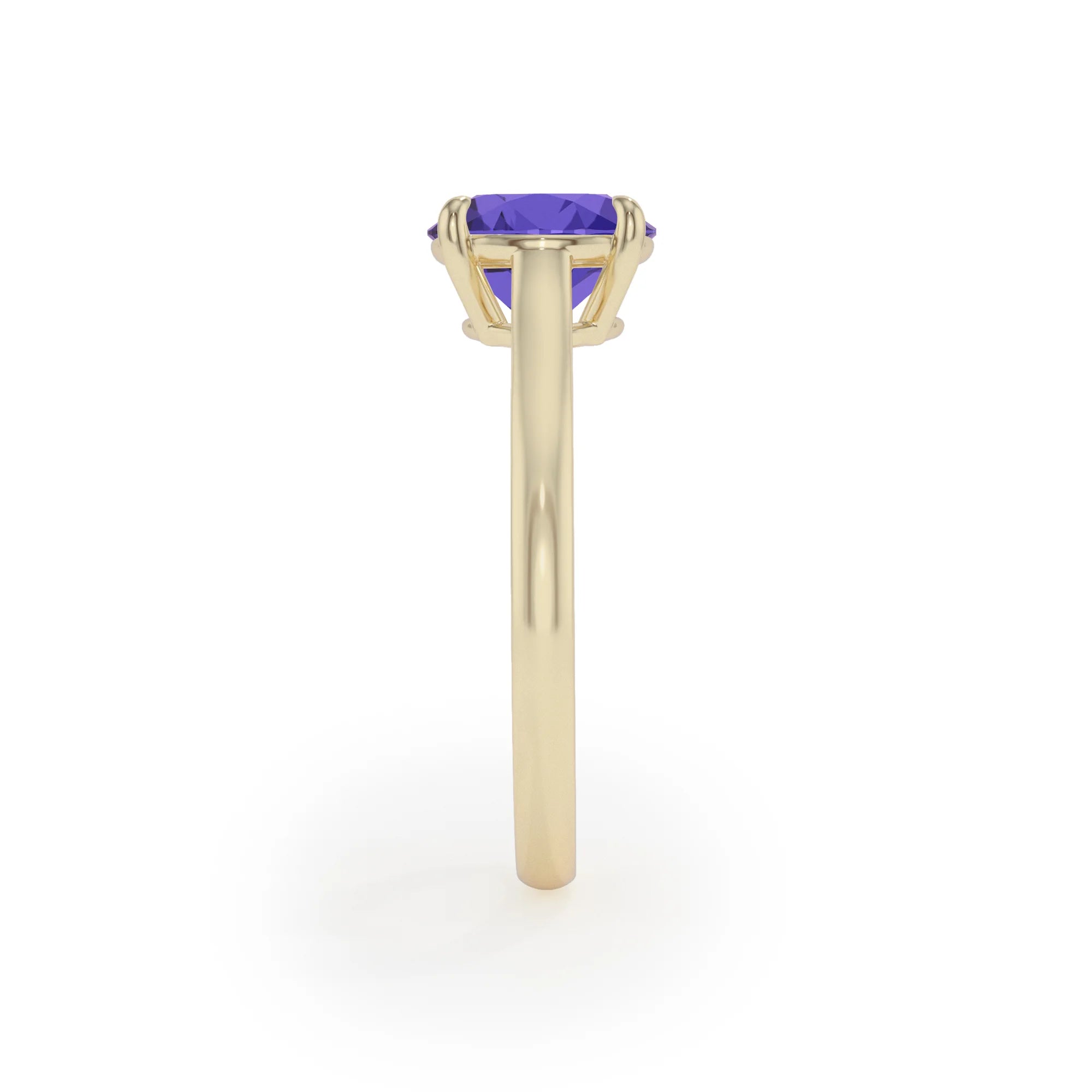 lab grown tanzanite round solitaire rings in yellow gold