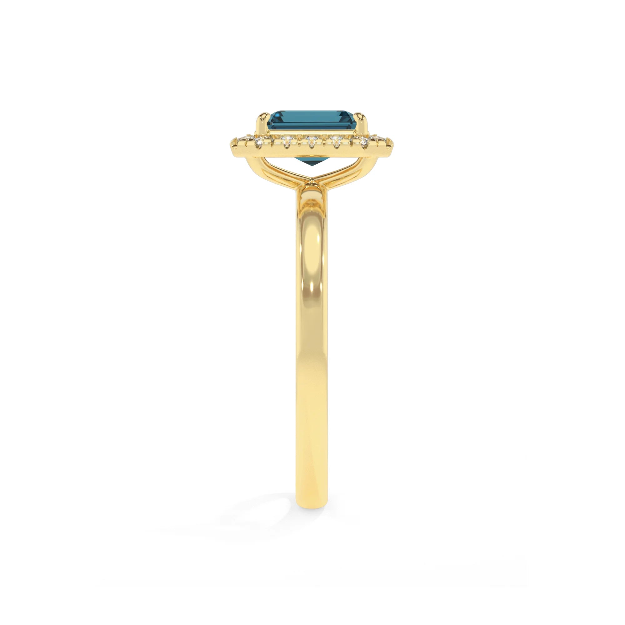 natural london-blue-topaz emerald cut solitaire rings in yellow gold