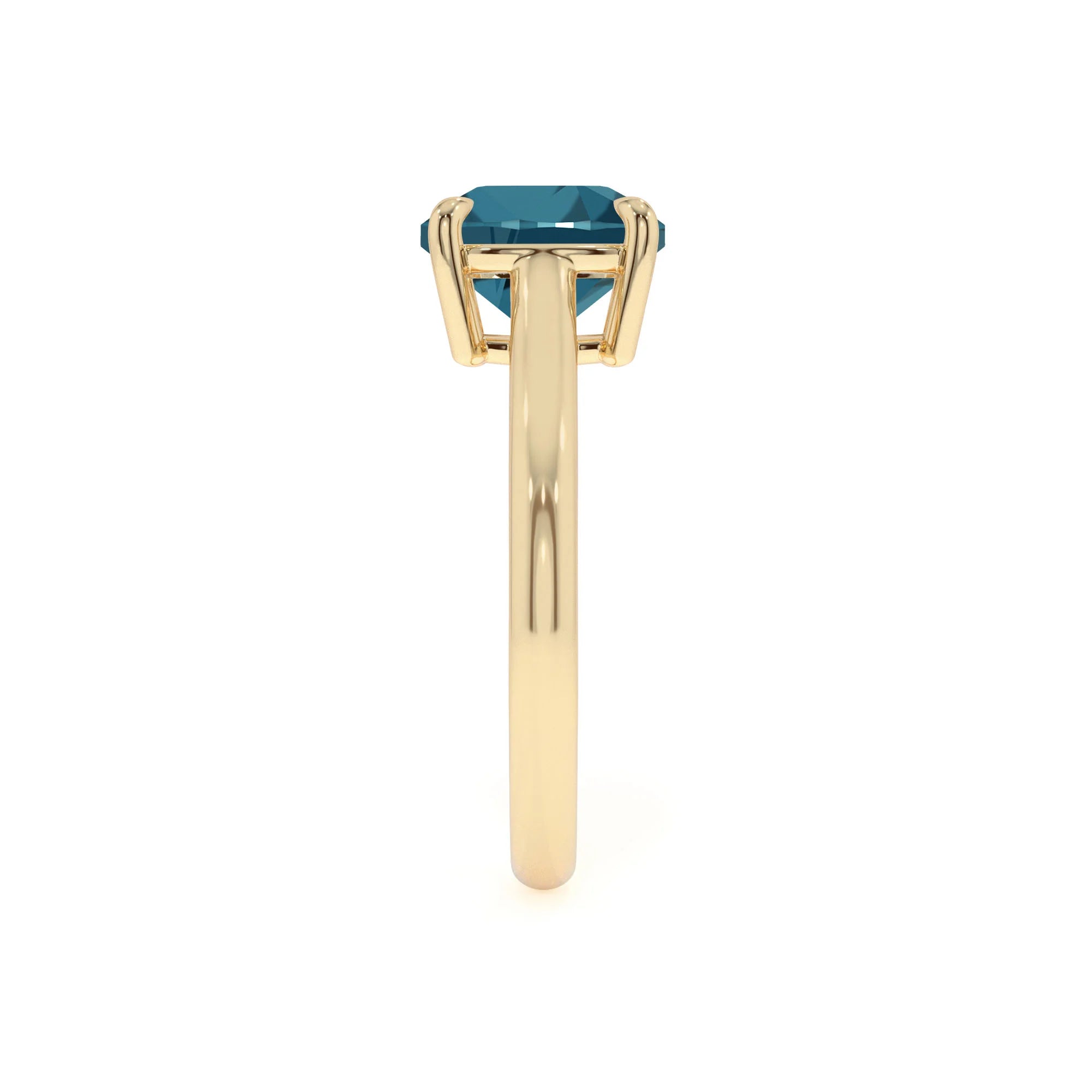 natural london-blue-topaz cushion solitaire rings in yellow gold