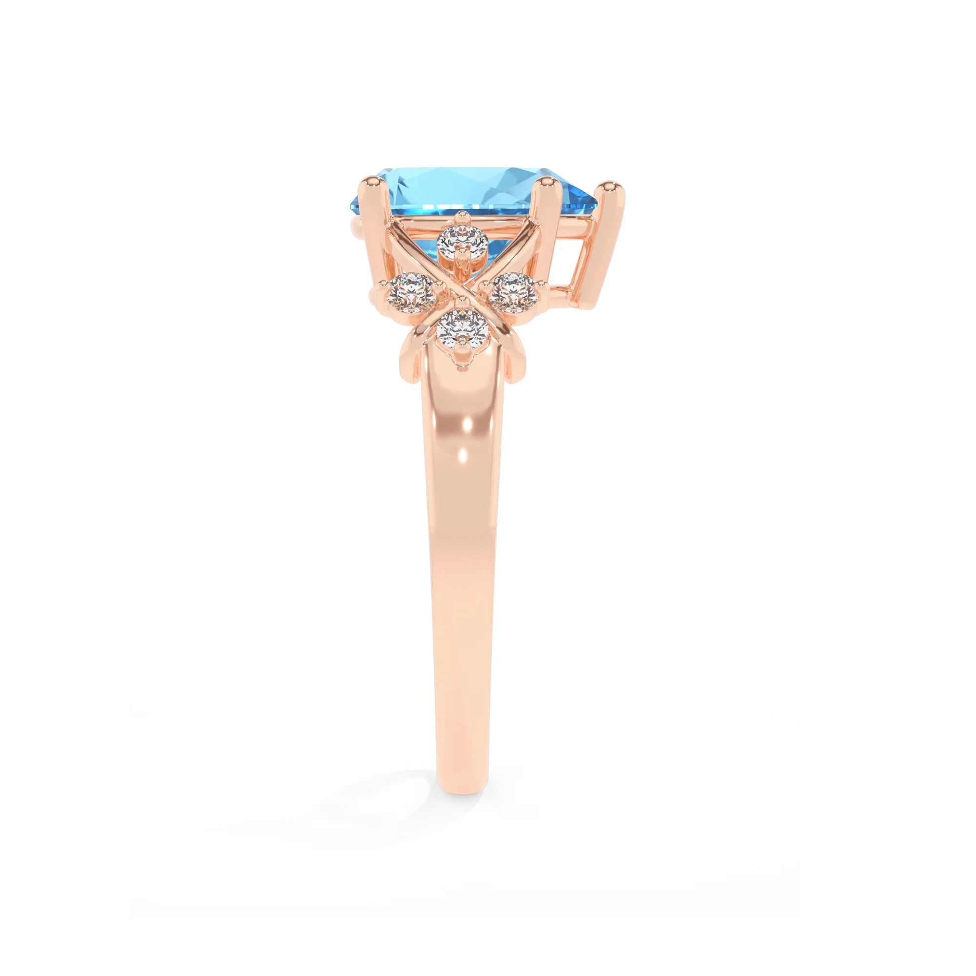 natural swiss-blue-topaz pear solitaire rings in rose gold