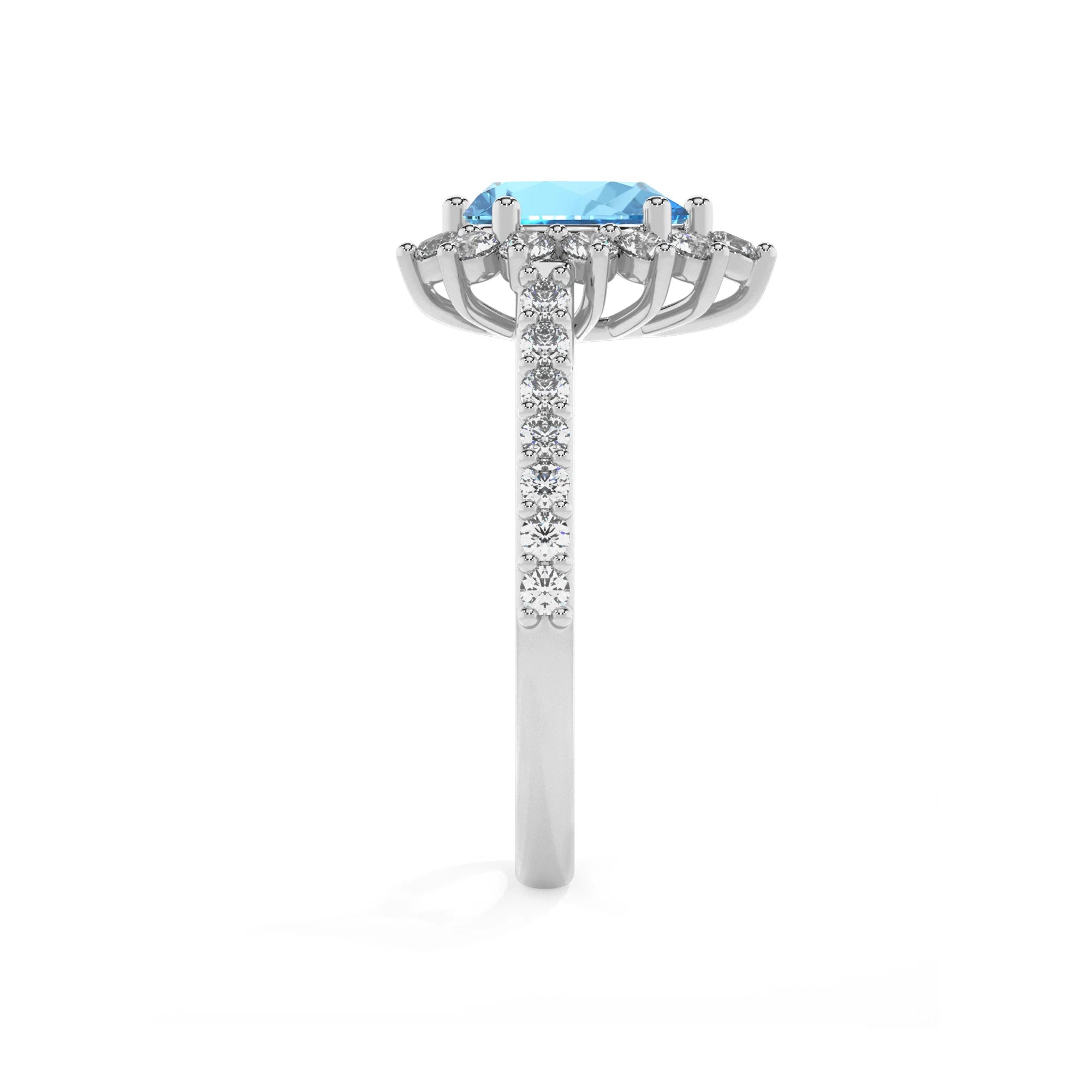 natural swiss-blue-topaz pear solitaire rings in sterling silver