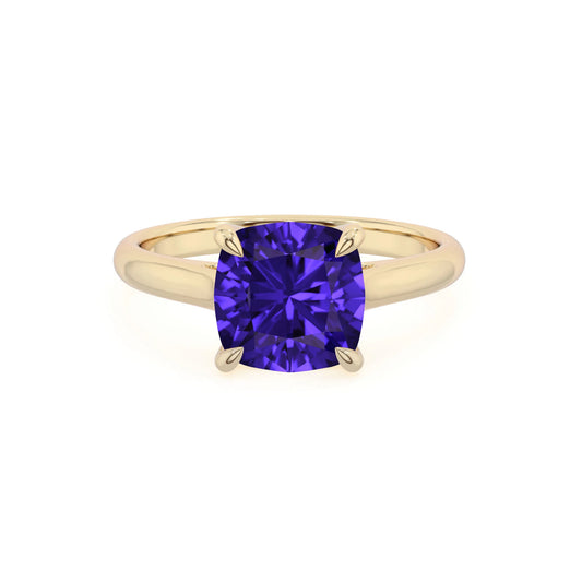 lab grown tanzanite cushion solitaire rings in yellow gold 