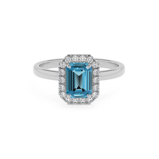 natural swiss-blue-topaz emerald cut solitaire rings in white gold 