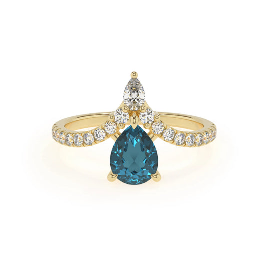 natural london-blue-topaz pear solitaire rings in yellow gold 