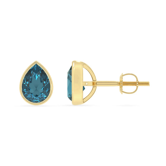 natural london blue topaz pear stud earrings in yellow gold 