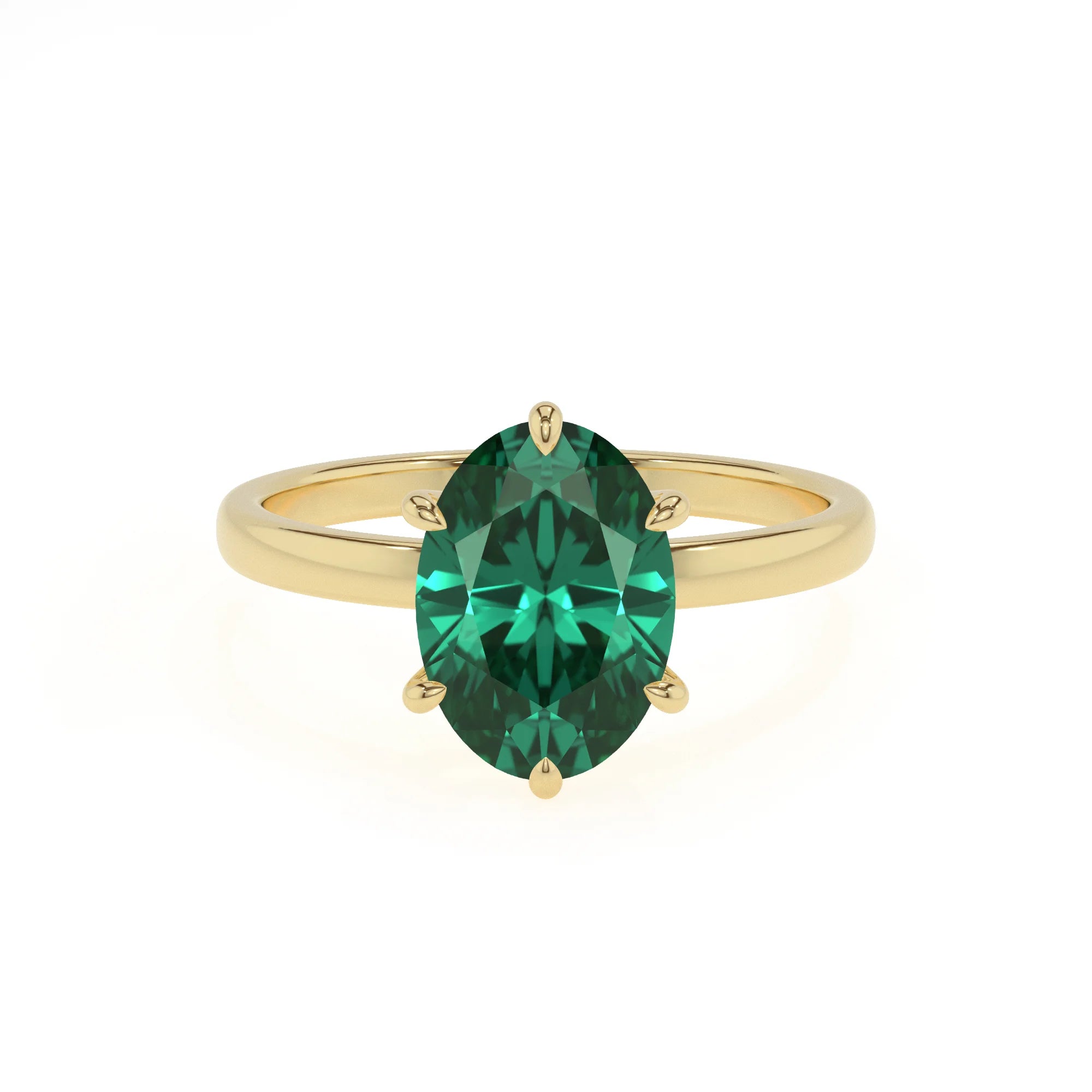 lab grown emerald oval solitaire rings in yellow gold 