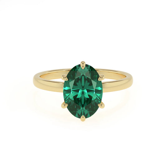 lab grown emerald oval solitaire rings in yellow gold 
