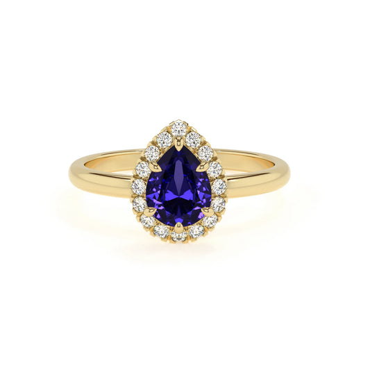 lab grown tanzanite pear solitaire rings in yellow gold 