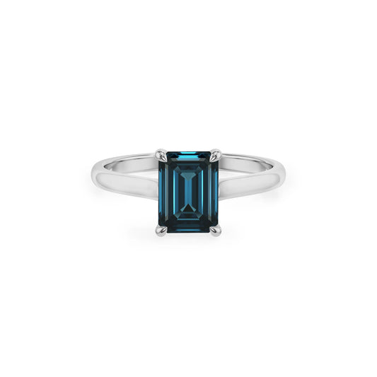 natural london-blue-topaz emerald cut solitaire rings in platinum 