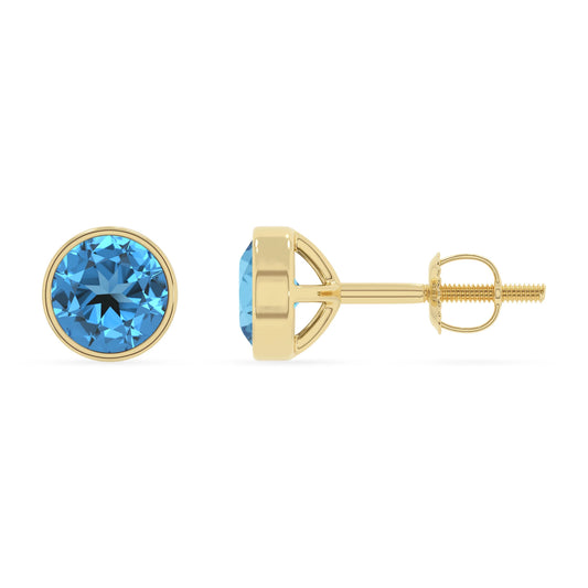 natural swiss blue topaz round stud earrings in yellow gold 