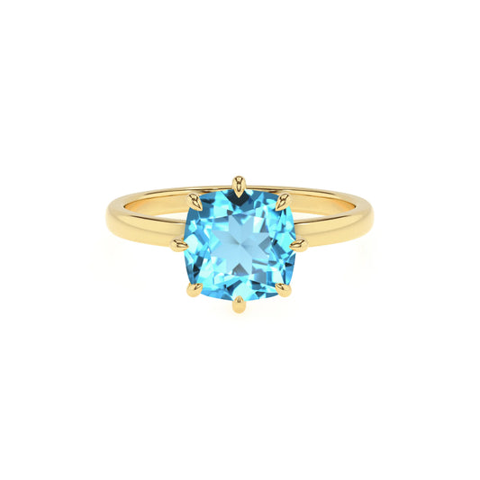 natural swiss-blue-topaz cushion solitaire rings in yellow gold 