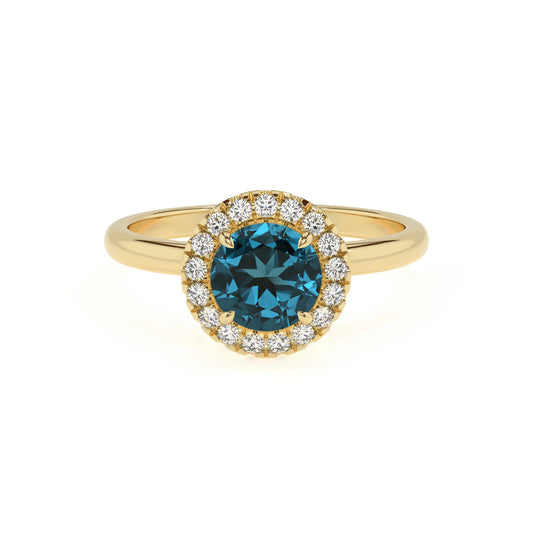 natural london-blue-topaz round solitaire rings in yellow gold 