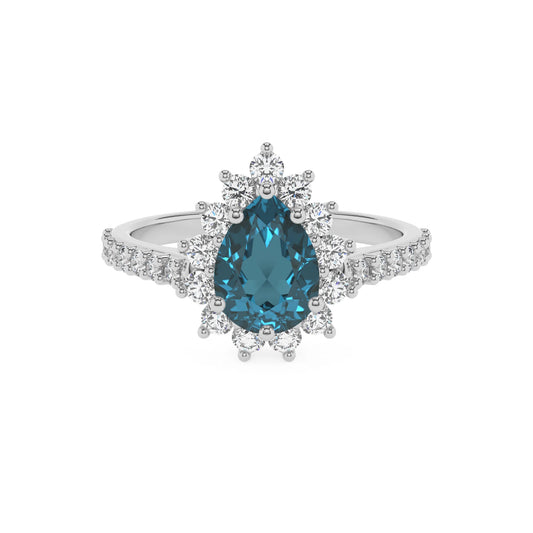 natural london-blue-topaz pear solitaire rings in sterling silver 