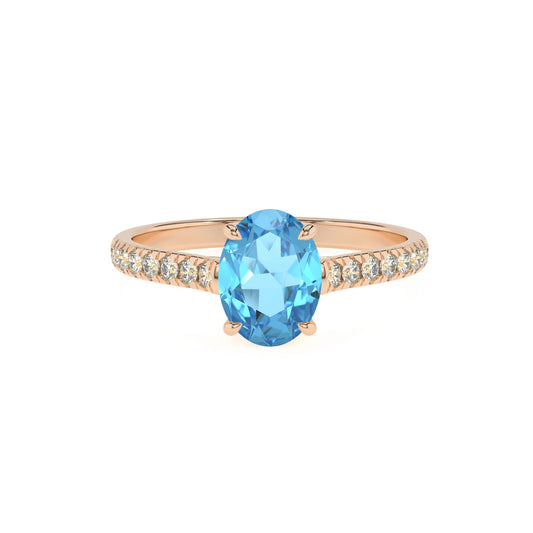 natural swiss-blue-topaz oval half eternity solitaire engagement rings in rose gold 