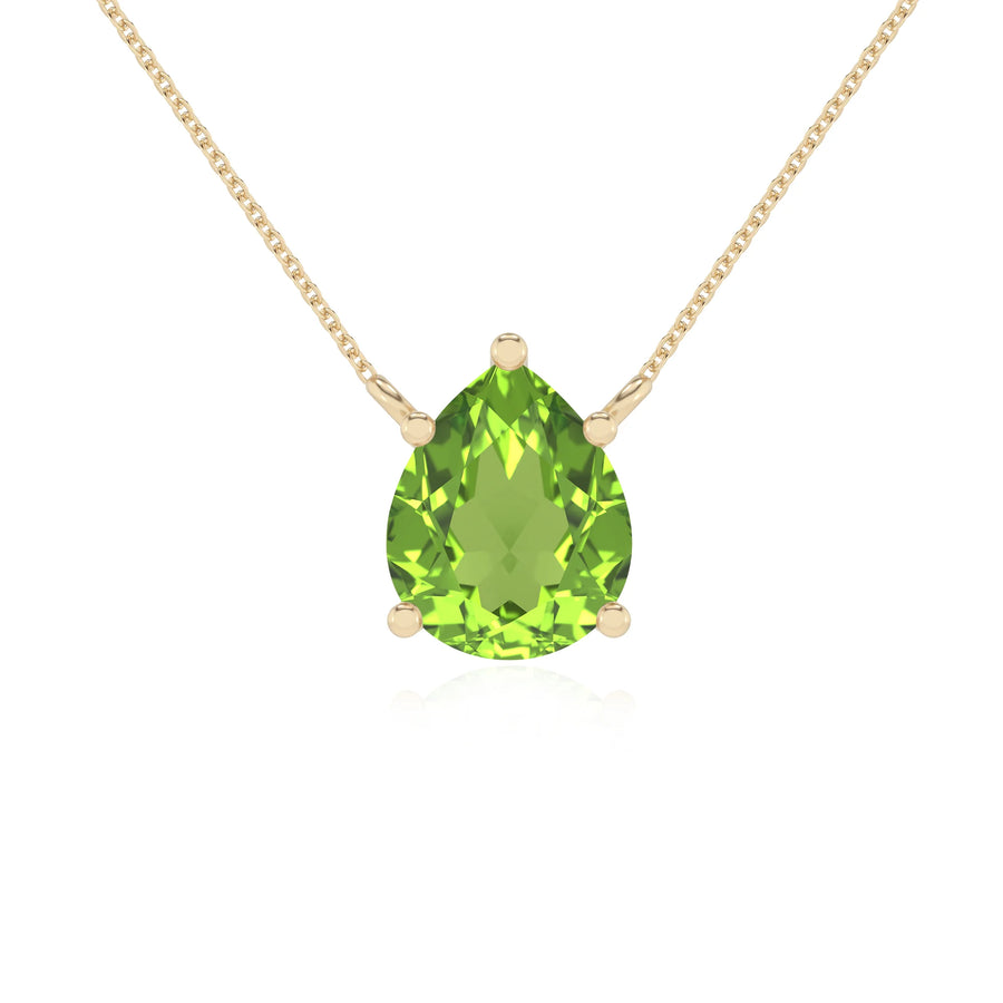 natural peridot pear solitaire necklaces in yellow gold 