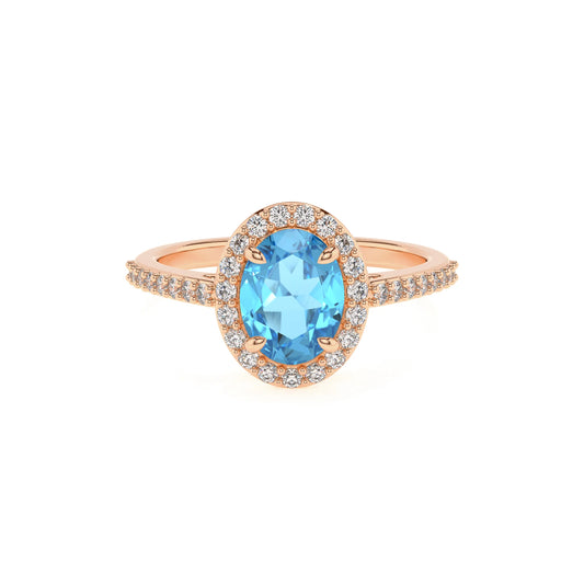 natural swiss-blue-topaz oval solitaire rings in rose gold 
