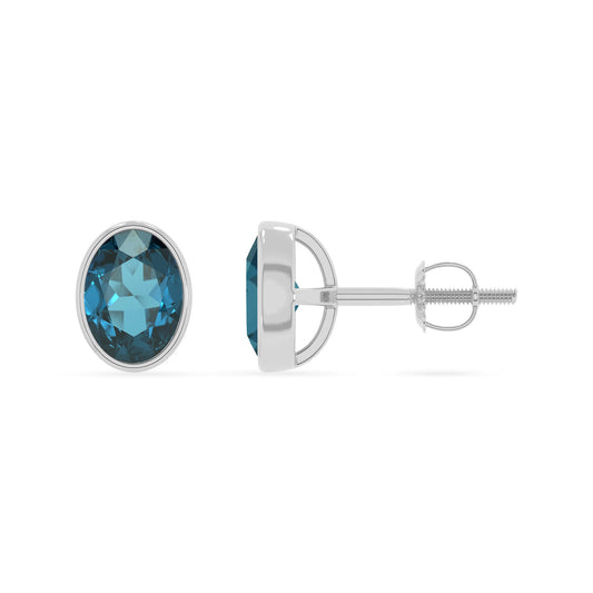 natural london blue topaz oval stud earrings in sterling silver 