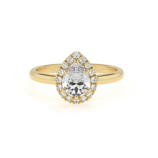 lab grown moissanite pear solitaire rings in yellow gold 