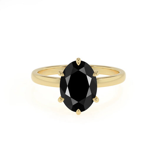 natural black-onyx oval solitaire rings in yellow gold 
