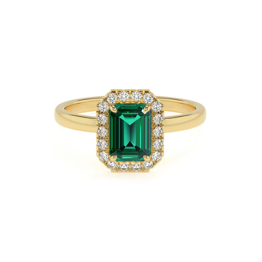 lab grown emerald octogon cut solitaire rings in yellow gold 