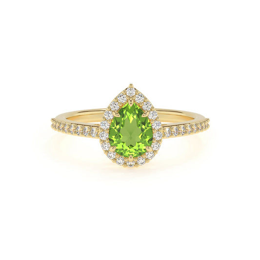 natural peridot pear solitaire rings in yellow gold 