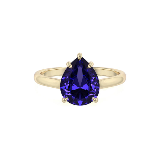 lab grown tanzanite pear solitaire rings in yellow gold 