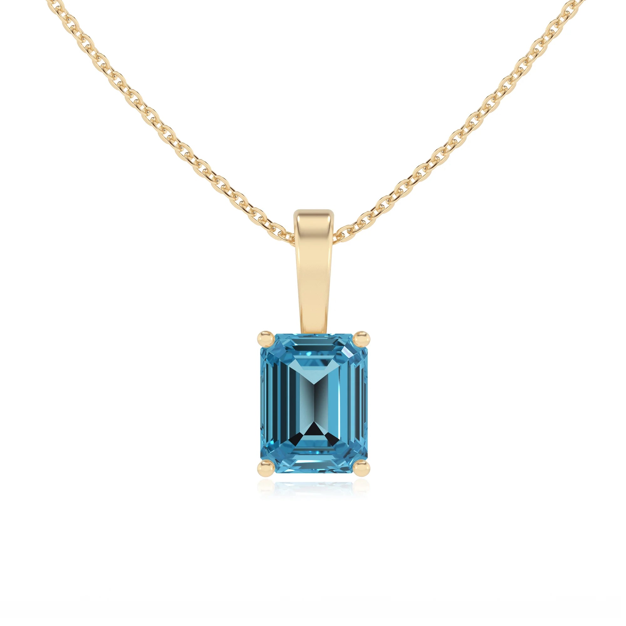 natural swiss-blue-topaz emerald cut solitaire necklaces in yellow gold 